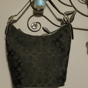Small shoulder coach bag.